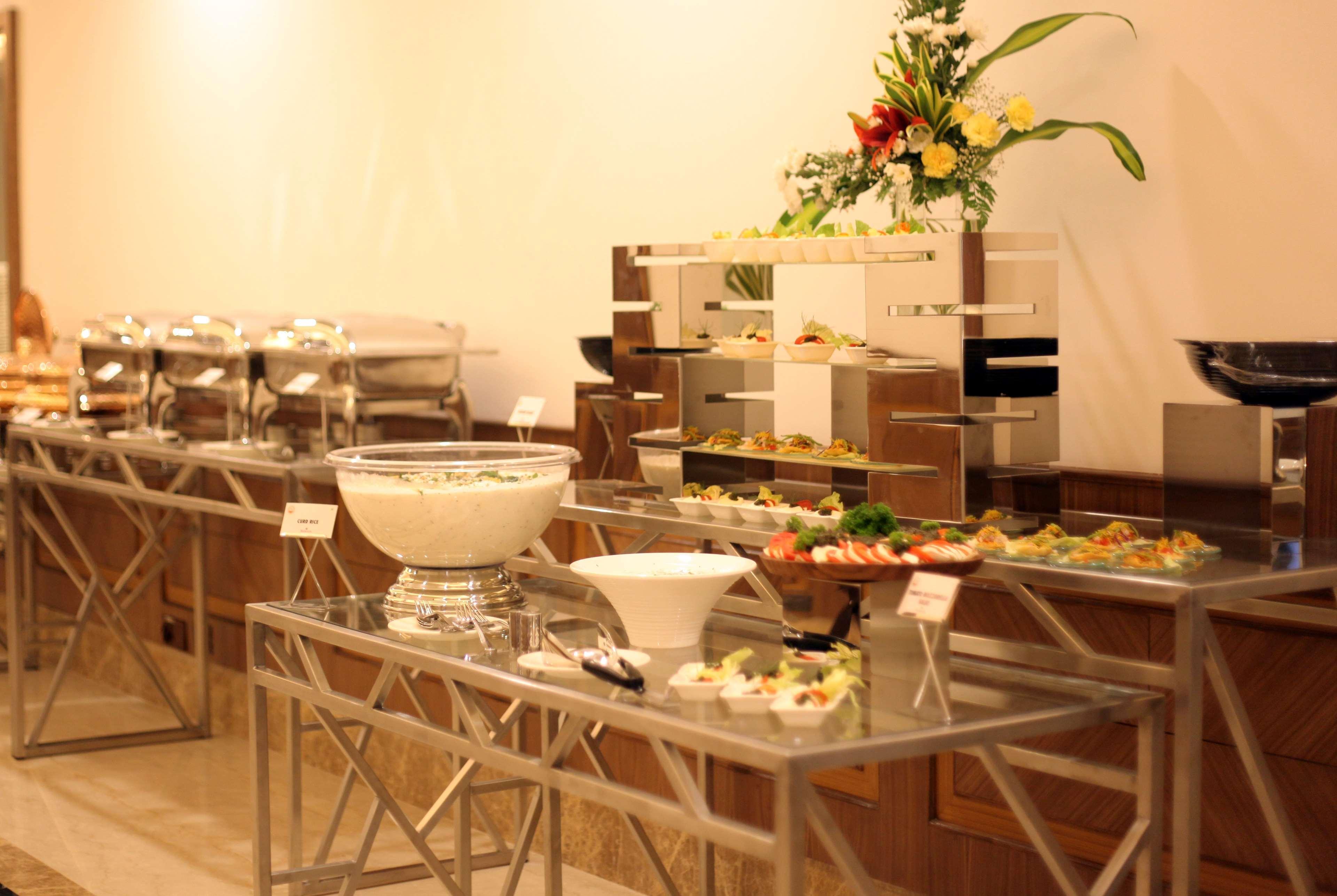 Ramada Plaza Chennai Hotel Exterior photo A buffet table
