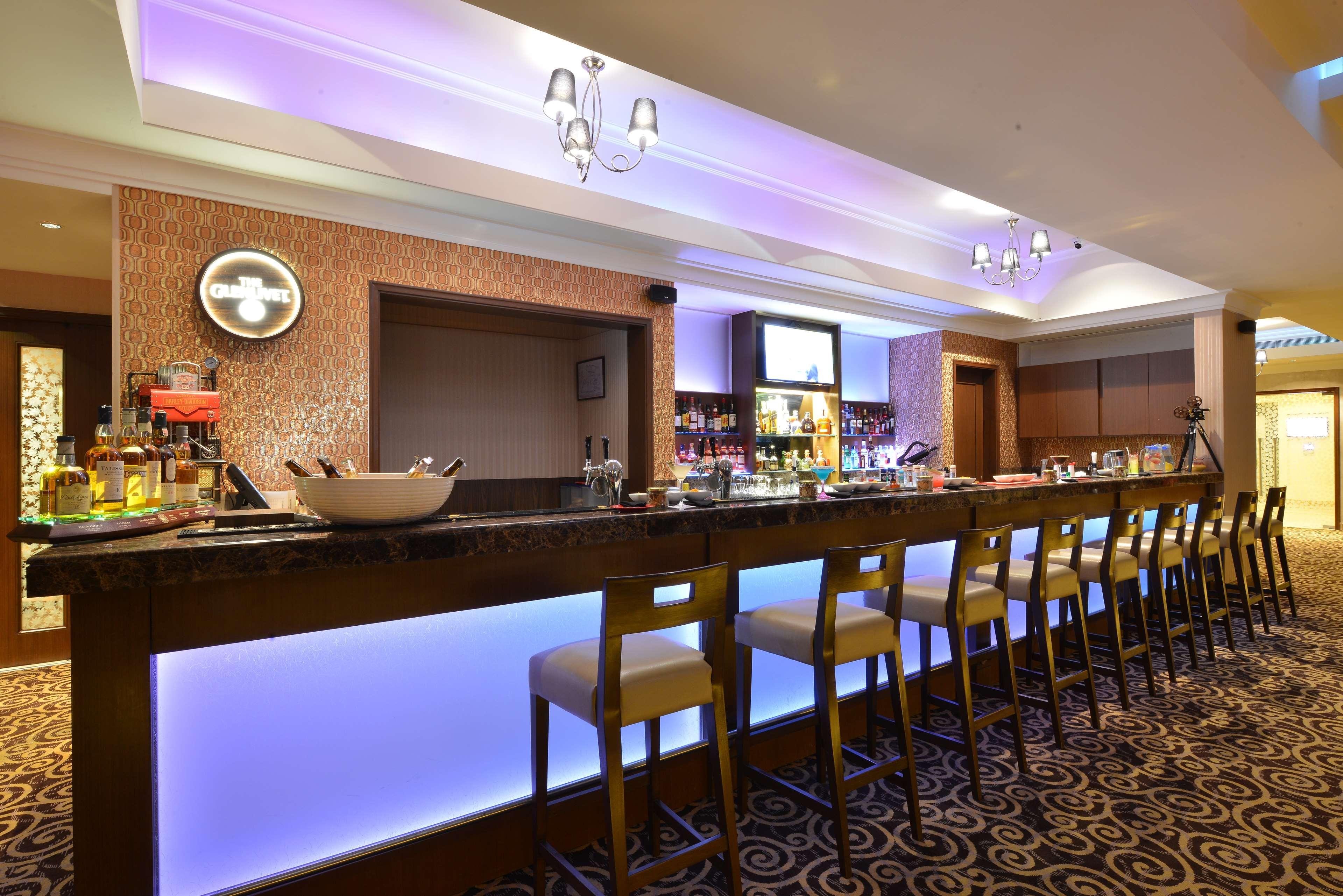 Ramada Plaza Chennai Hotel Exterior photo The bar at the hotel