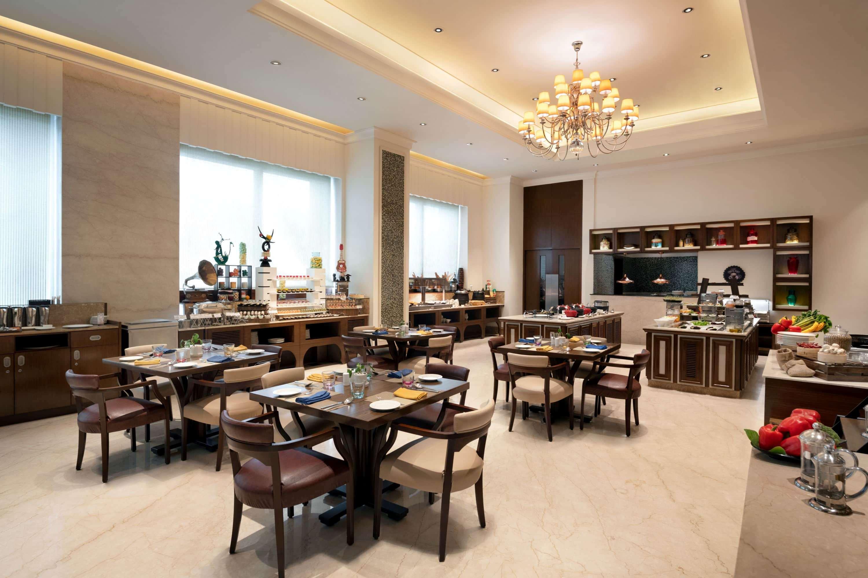 Ramada Plaza Chennai Hotel Exterior photo The restaurant