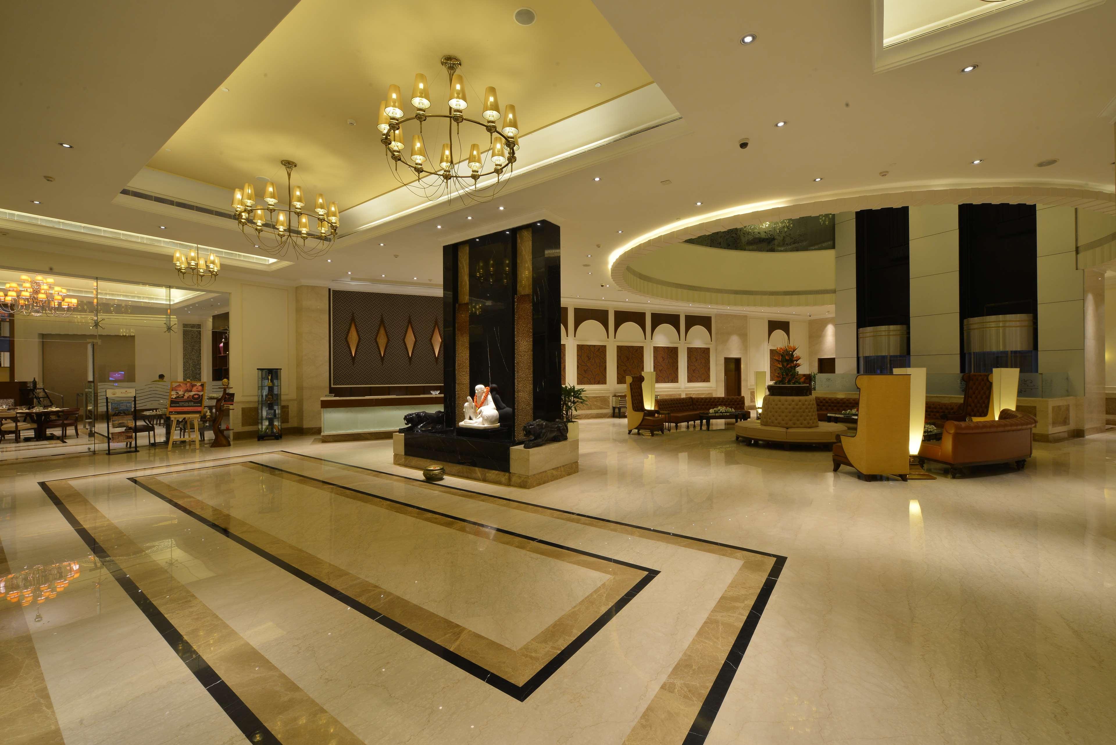 Ramada Plaza Chennai Hotel Exterior photo The lobby of the Taj Bengal