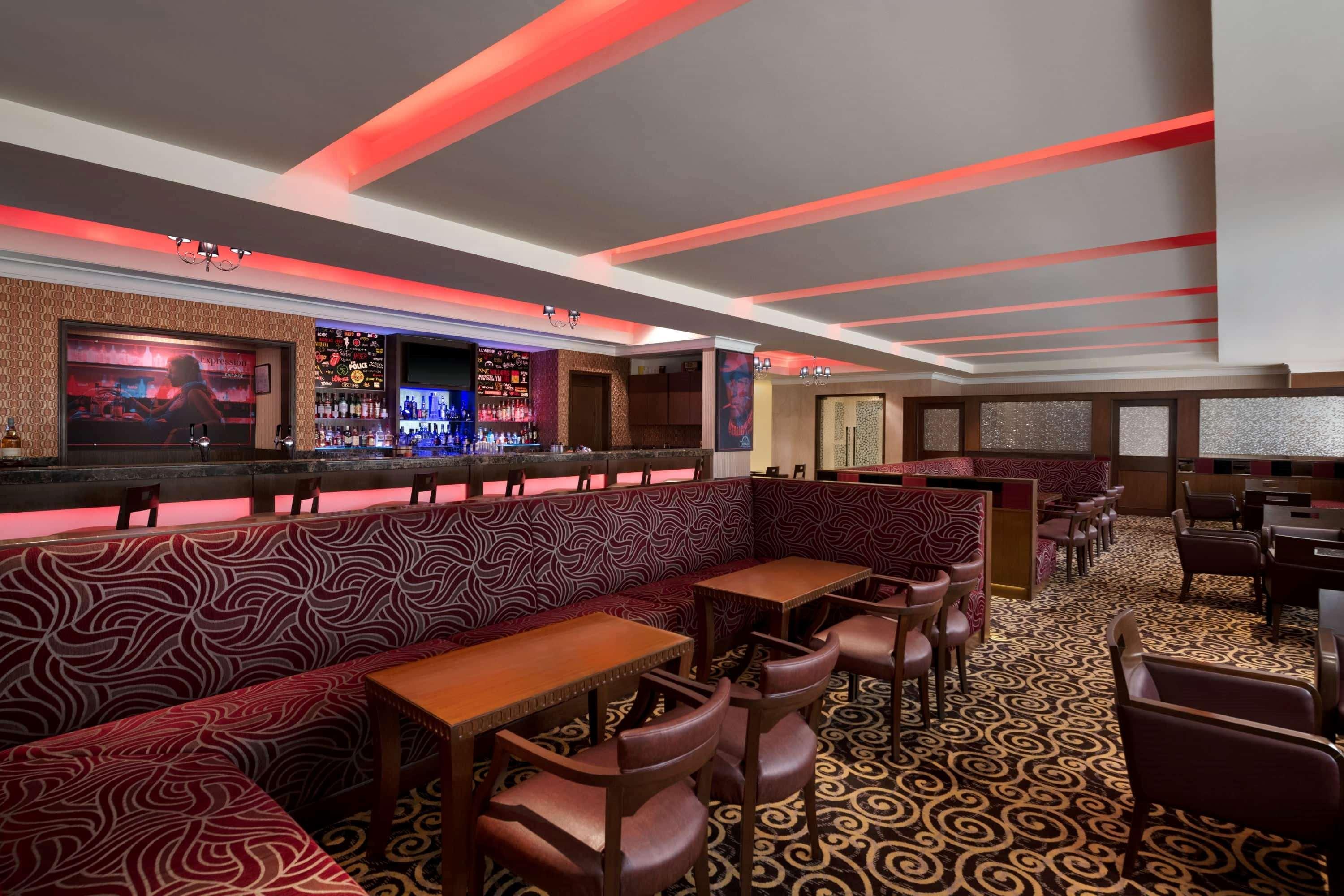 Ramada Plaza Chennai Hotel Exterior photo The interior of the bar
