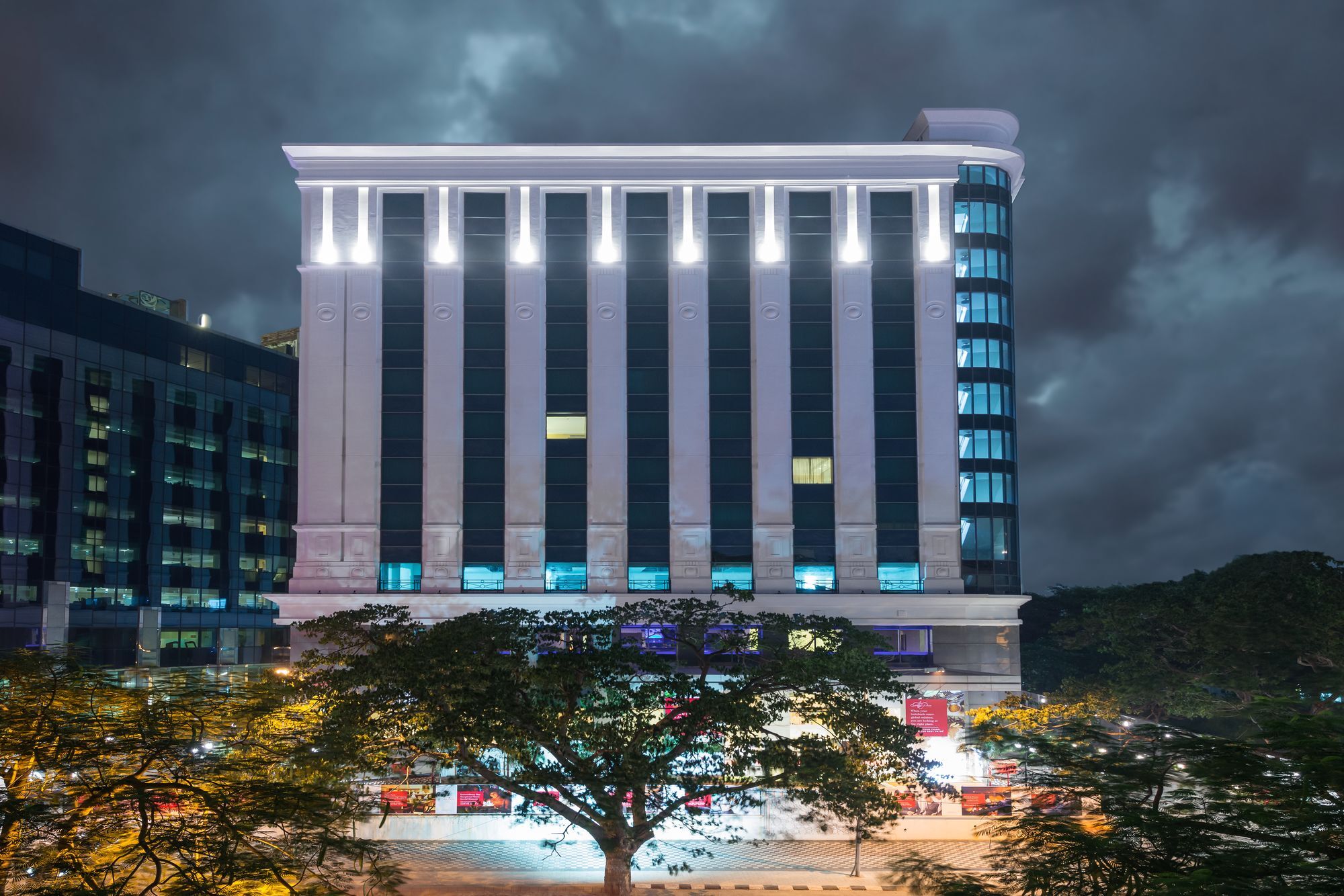 Ramada Plaza Chennai Hotel Exterior photo The hotel at night